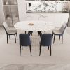 47-63" expandable circular dining tables , equipped with 6 PU fabric thick cushioned dining chairs and an elegant and spacious dining table